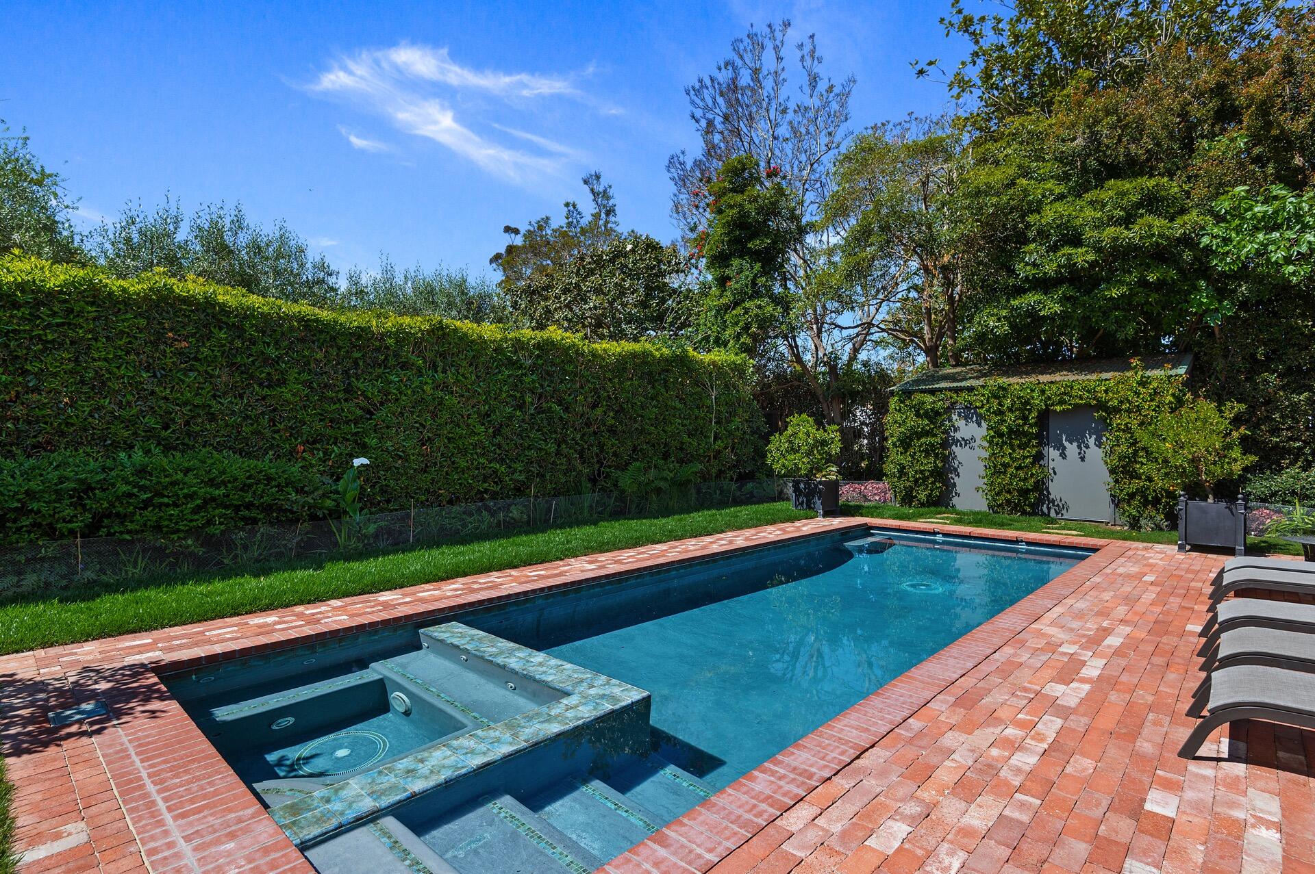 Undisclosed Address Montecito, CA 93108 - Photo 15 of 33 a view of a pool with a yard