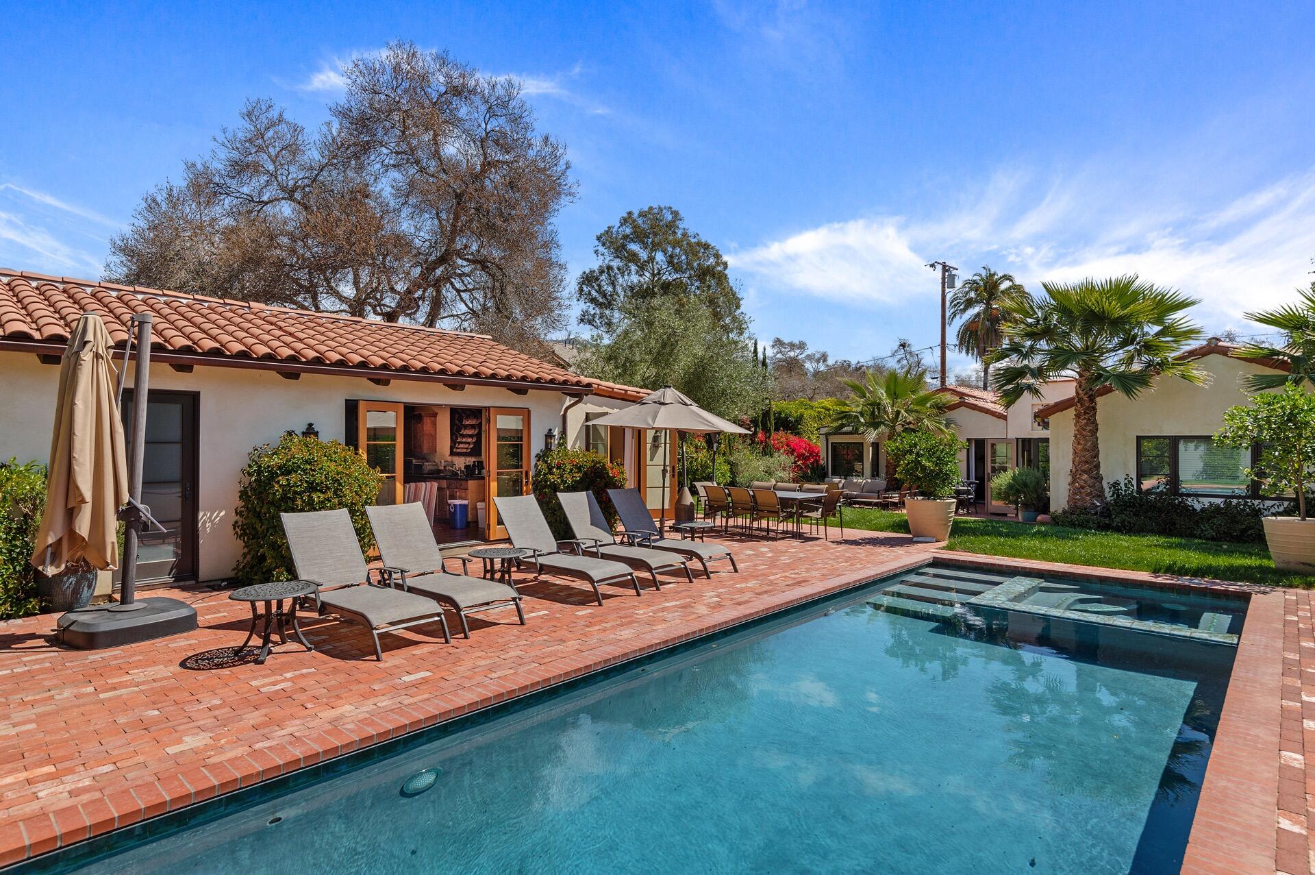 Undisclosed Address Montecito, CA 93108 - Photo 16 of 33 a view of a house with swimming pool and sitting area
