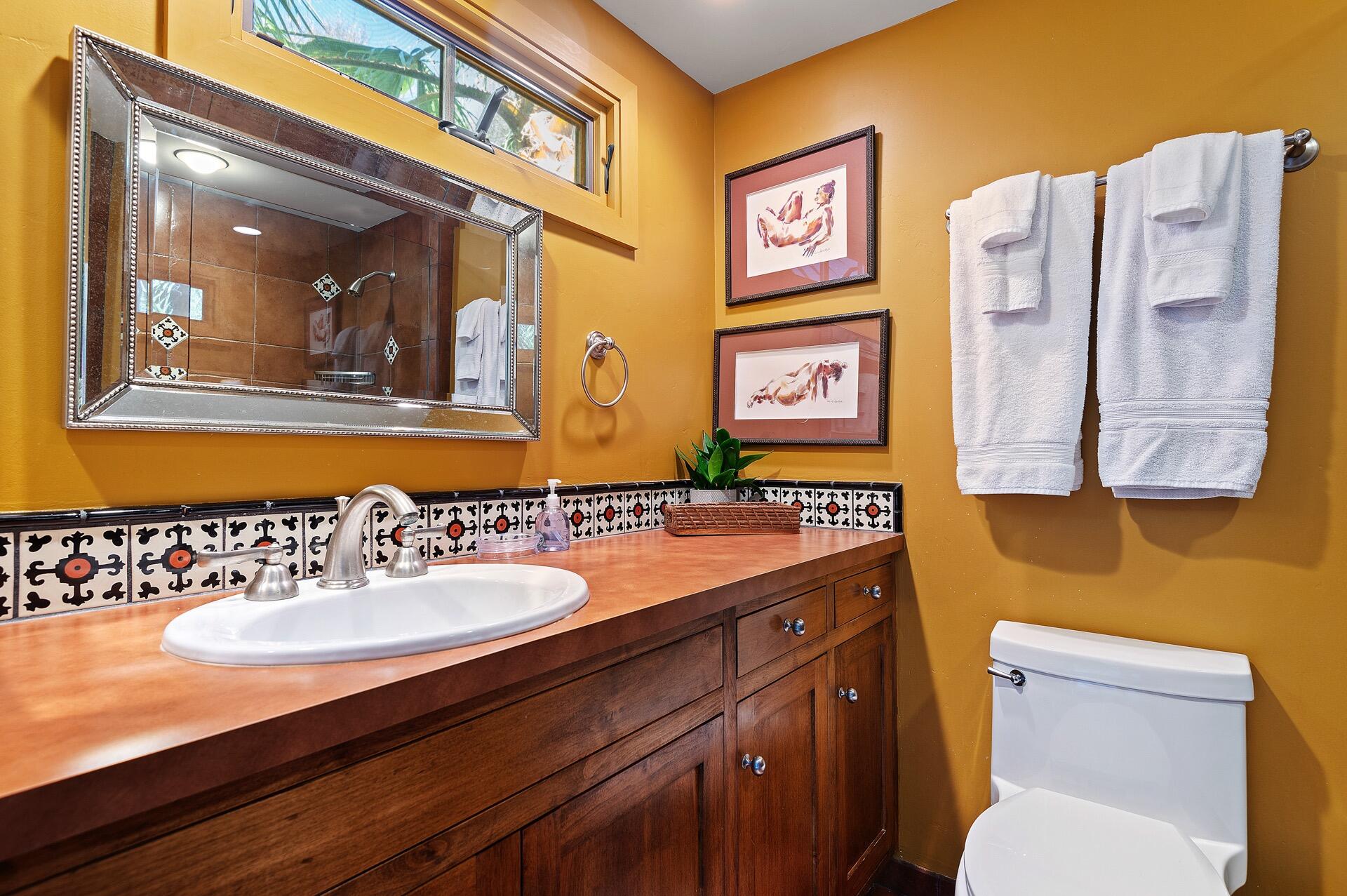 Undisclosed Address Montecito, CA 93108 - Photo 20 of 33 a bathroom with a toilet sink and mirror