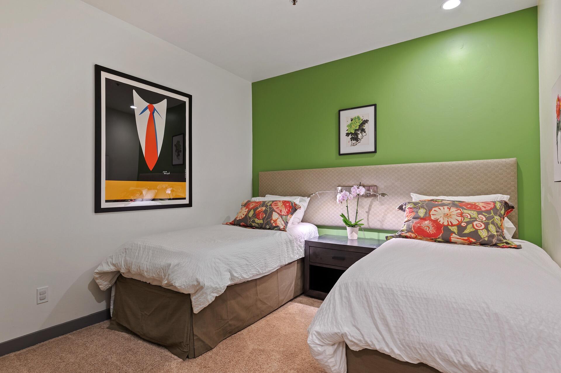 Undisclosed Address Montecito, CA 93108 - Photo 24 of 33 a bedroom with 2 bed and a painting on the wall