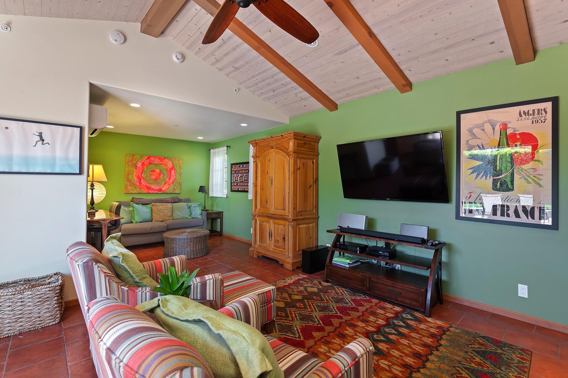 Undisclosed Address Montecito, CA 93108 - Photo 26 of 33 a living room with furniture and a flat screen tv