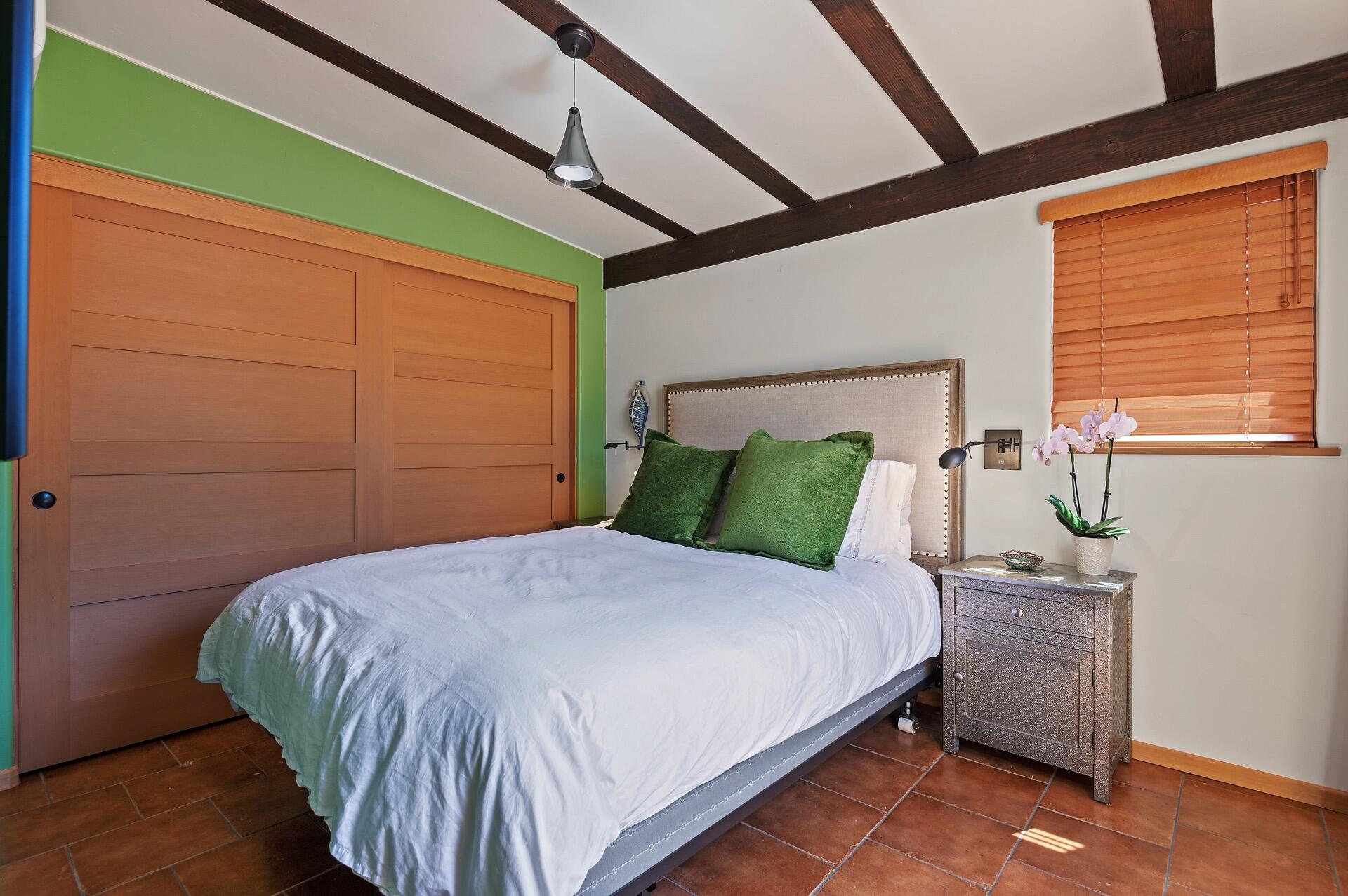 Undisclosed Address Montecito, CA 93108 - Photo 28 of 33 a bedroom with a bed and a window