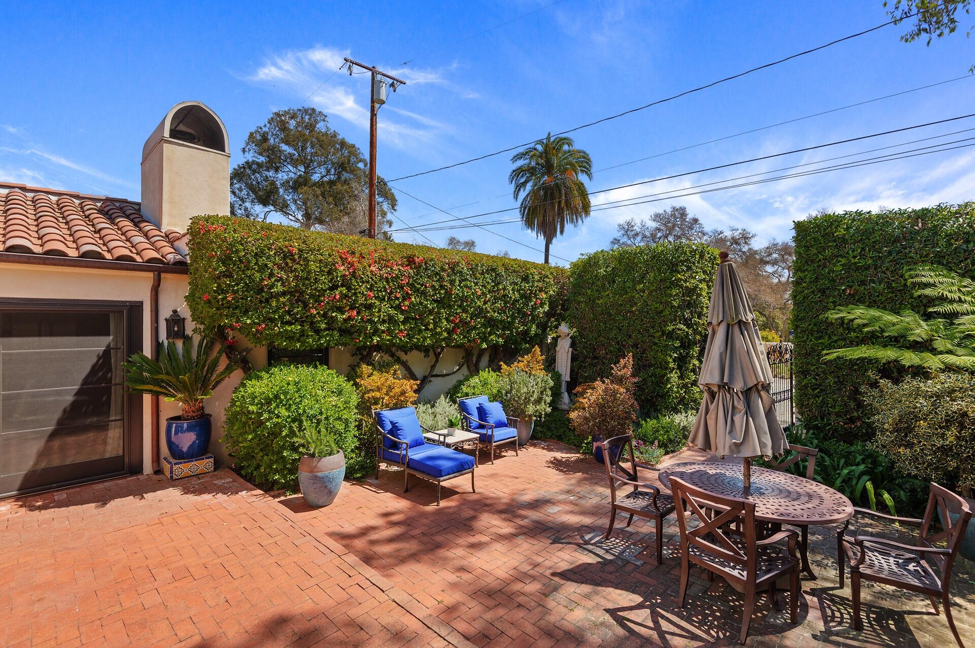 Undisclosed Address Montecito, CA 93108 - Photo 30 of 33 a view of a patio with table and chairs potted plants