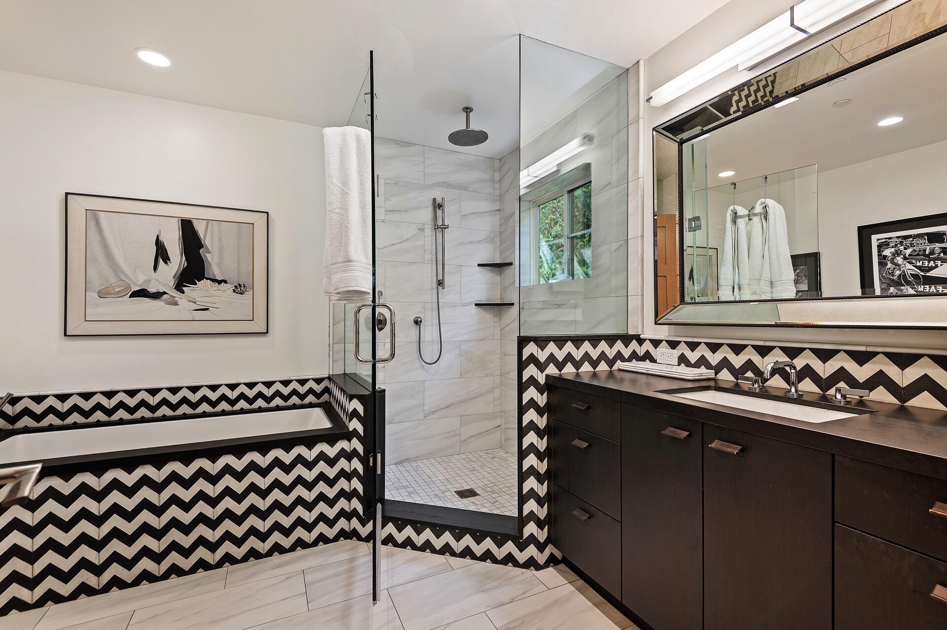 Undisclosed Address Montecito, CA 93108 - Photo 8 of 33 a bathroom with a sink a mirror and a shower