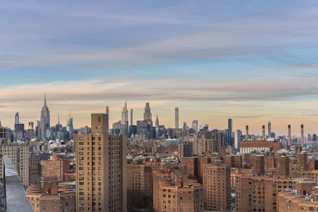 a bathroom with a sink a toilet and bathtub