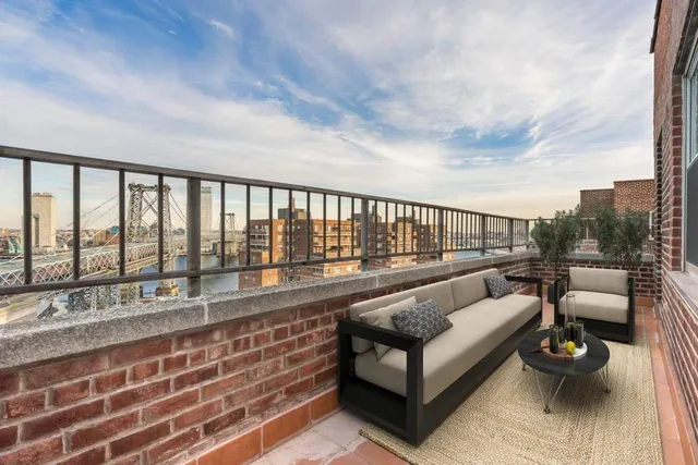 a view of a lake with a city