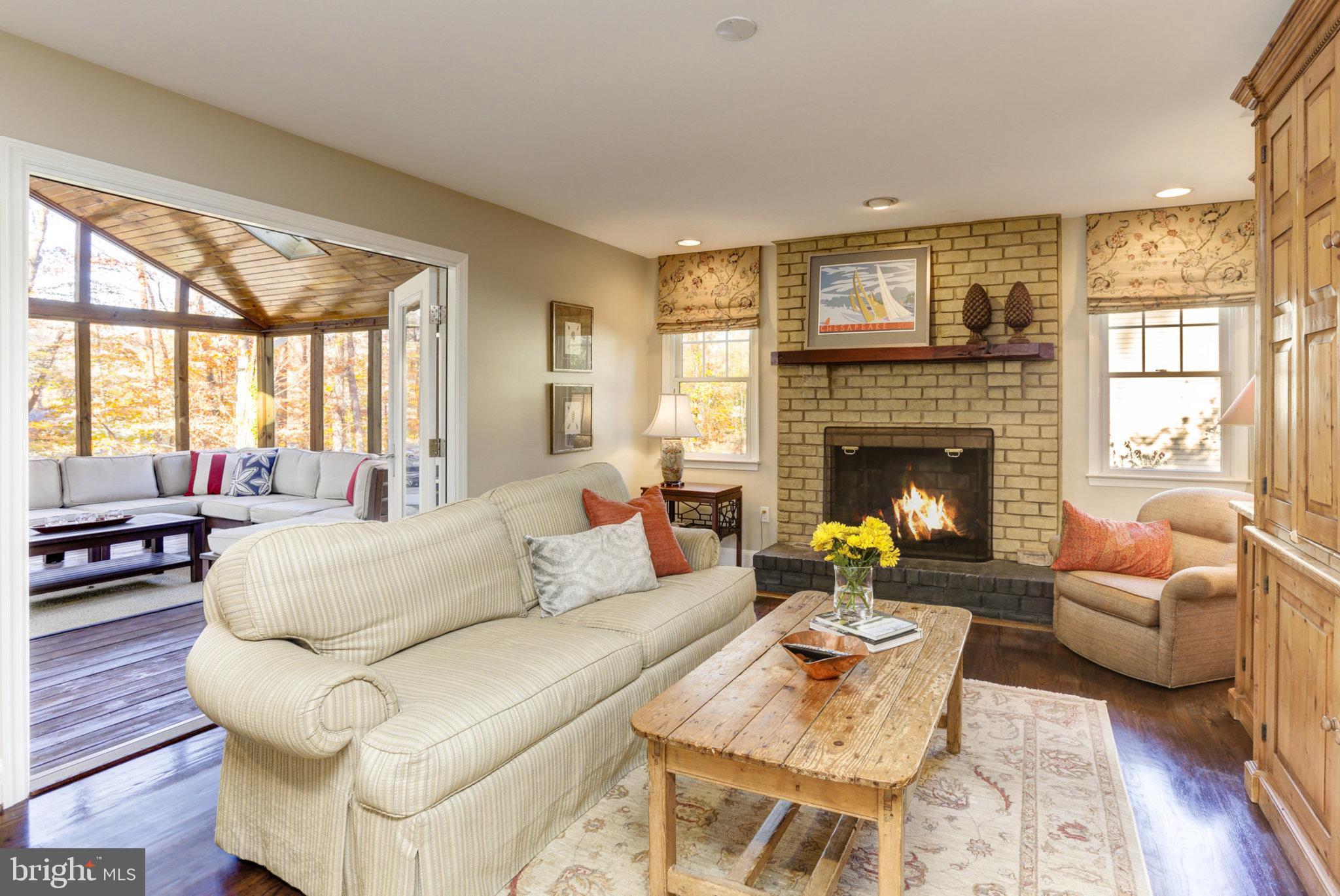 14 Old Sturbridge Road Arnold, MD 21012 - Photo 4 of 56 Family Room with Gas Fireplace open to porch