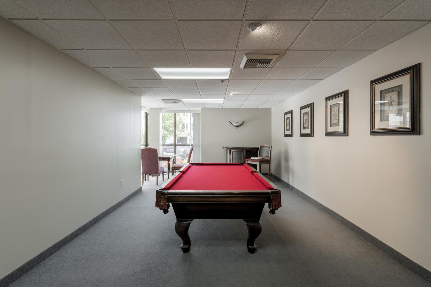 110 Park Road, Unit 202 Burlingame, CA 94010 - Photo 26 of 31 a room with pool table and windows