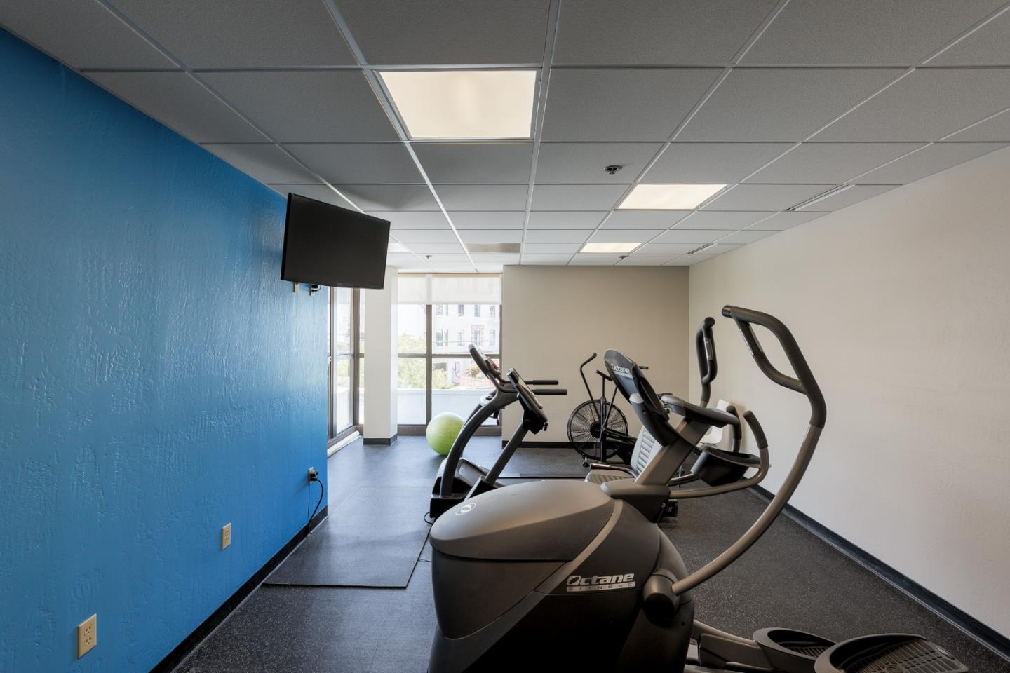 110 Park Road, Unit 202 Burlingame, CA 94010 - Photo 28 of 31 a view of a room with gym equipment