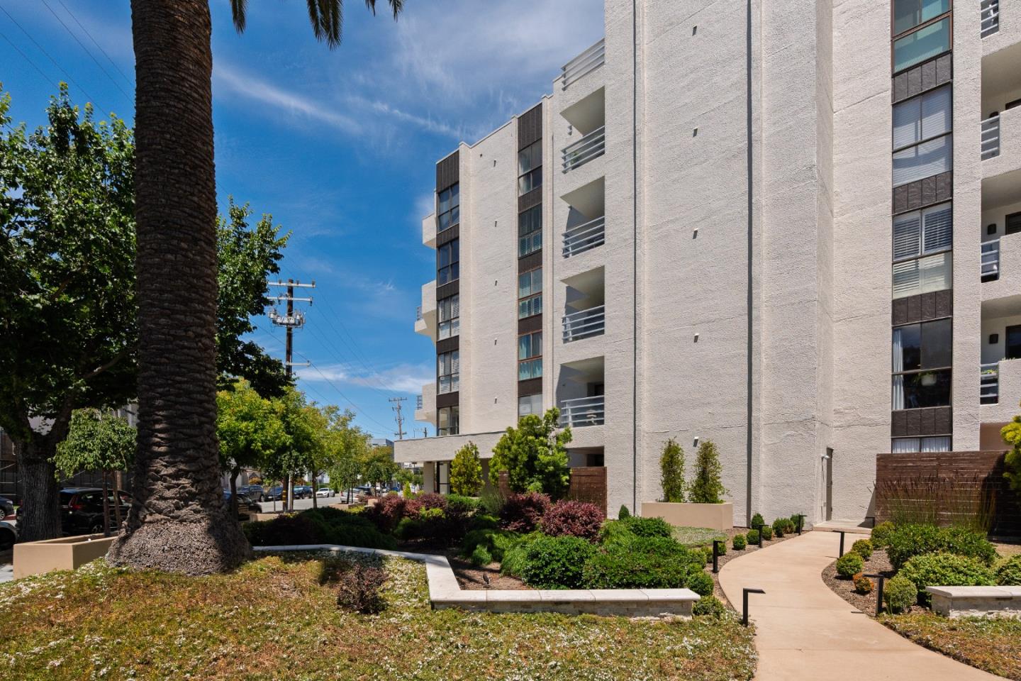 110 Park Road, Unit 202 Burlingame, CA 94010 - Photo 29 of 31 a view of a building with potted plants