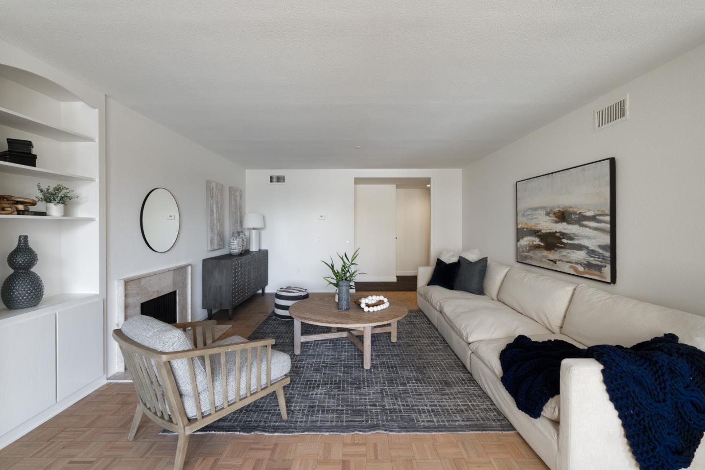 110 Park Road, Unit 202 Burlingame, CA 94010 - Photo 6 of 31 a living room with furniture