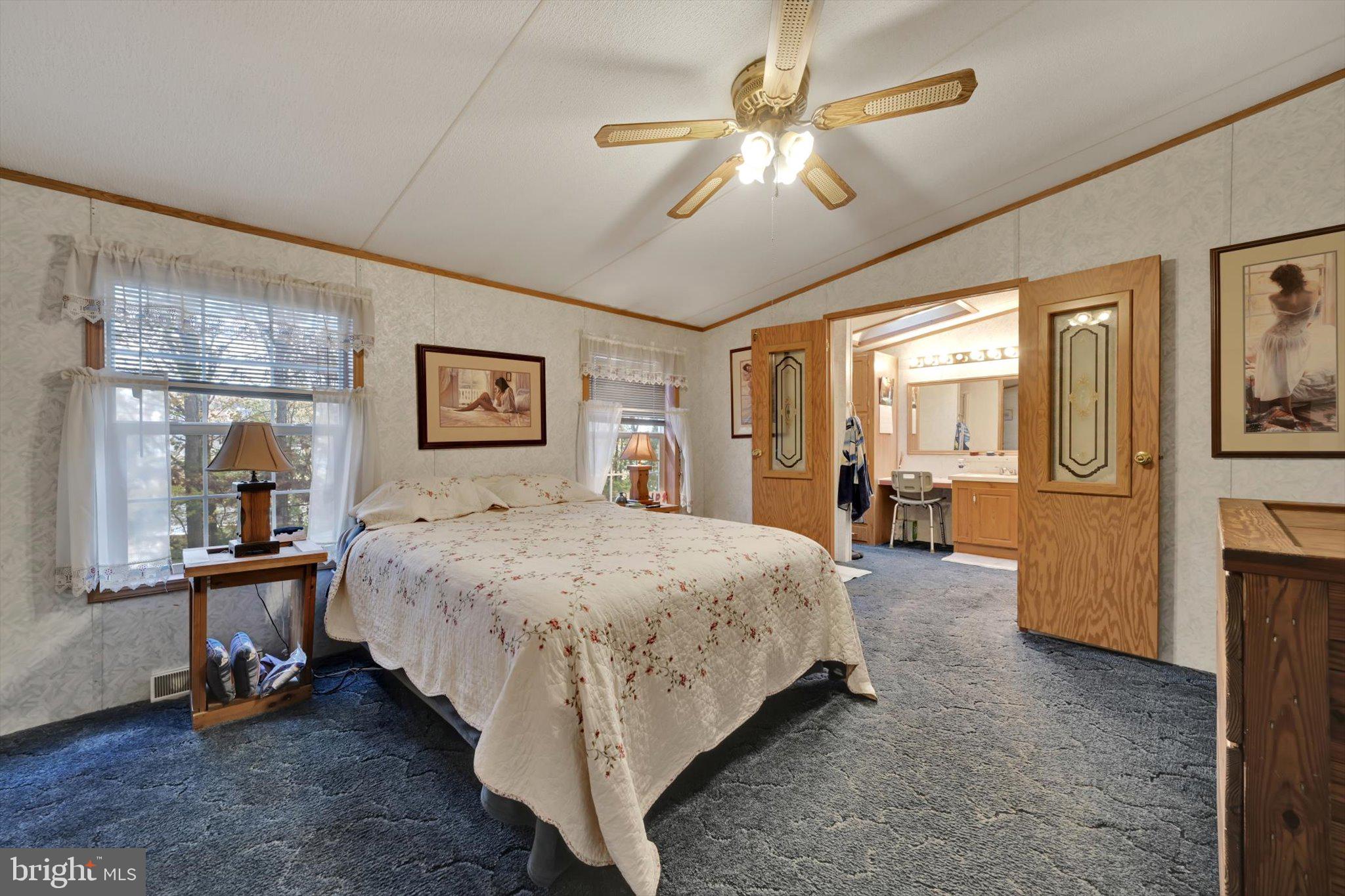 1104 Bedford Avenue Reading, PA 19607 - Photo 20 of 39 a bed room with a bed and a chandelier