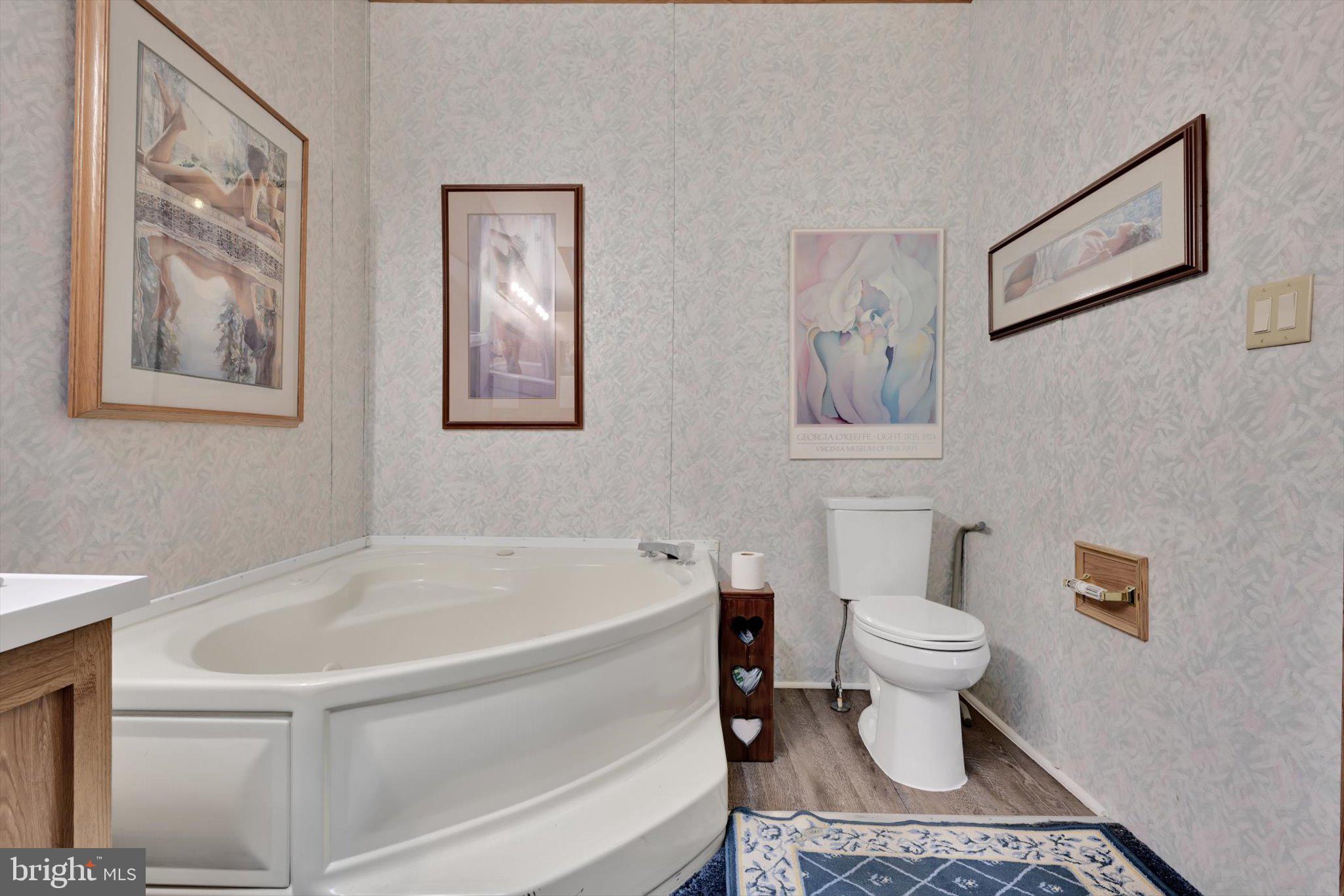 1104 Bedford Avenue Reading, PA 19607 - Photo 23 of 39 a white toilet sitting next to a bathroom sink