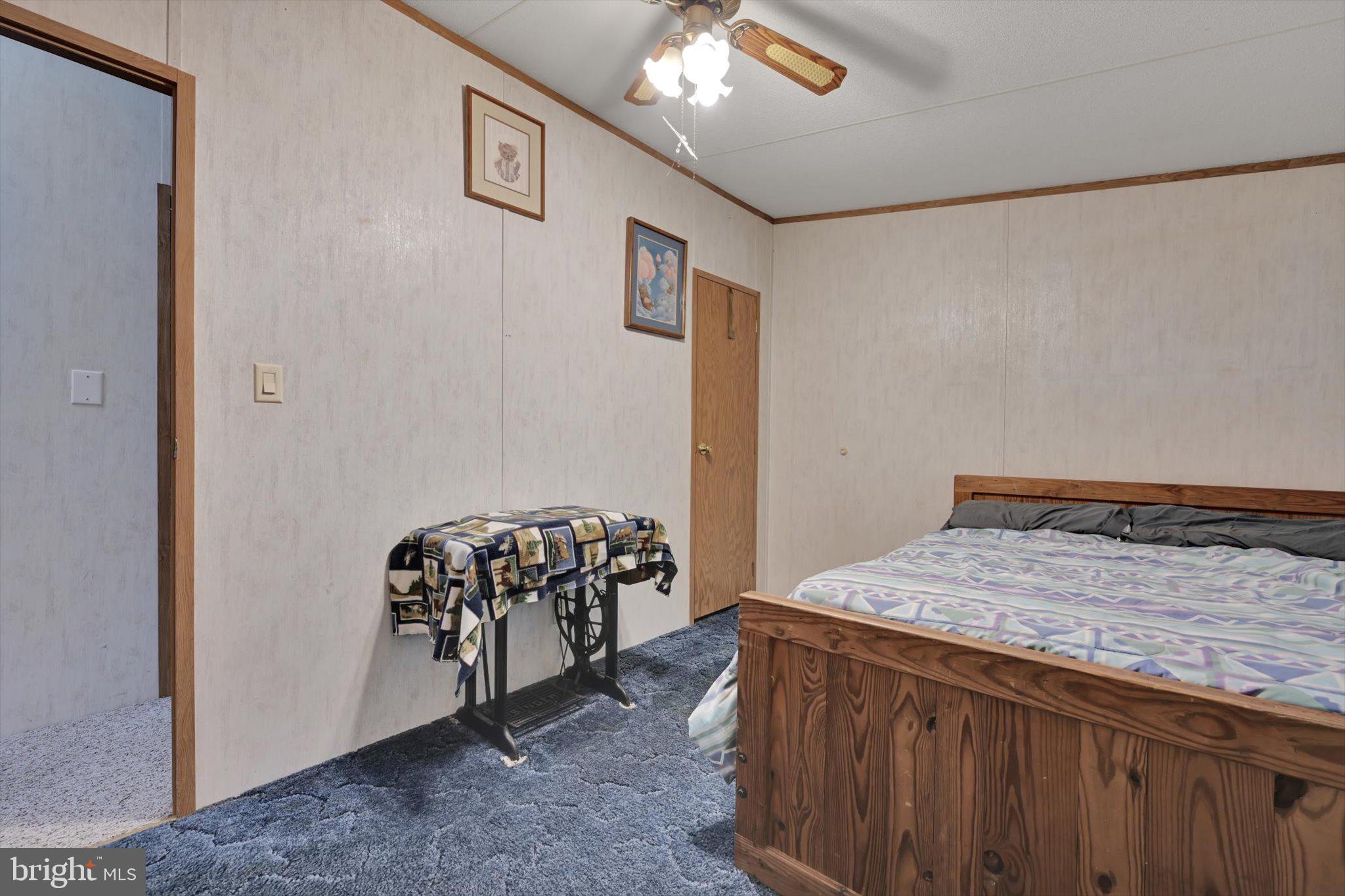 1104 Bedford Avenue Reading, PA 19607 - Photo 26 of 39 a bedroom with a bed and a table