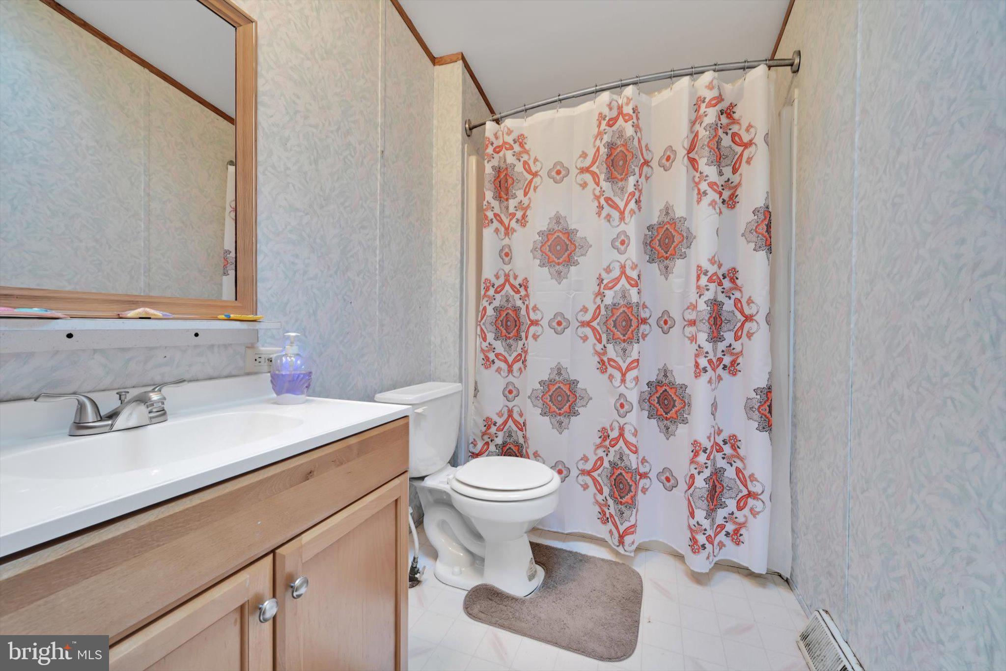 1104 Bedford Avenue Reading, PA 19607 - Photo 28 of 39 a bathroom with a sink and a toilet