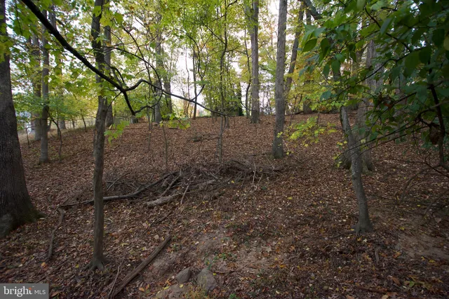 a view of swimming pool with outdoor seating