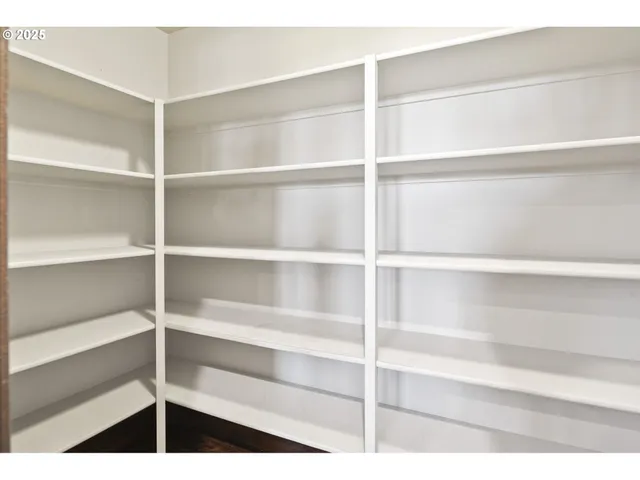 a view of a room with shelves