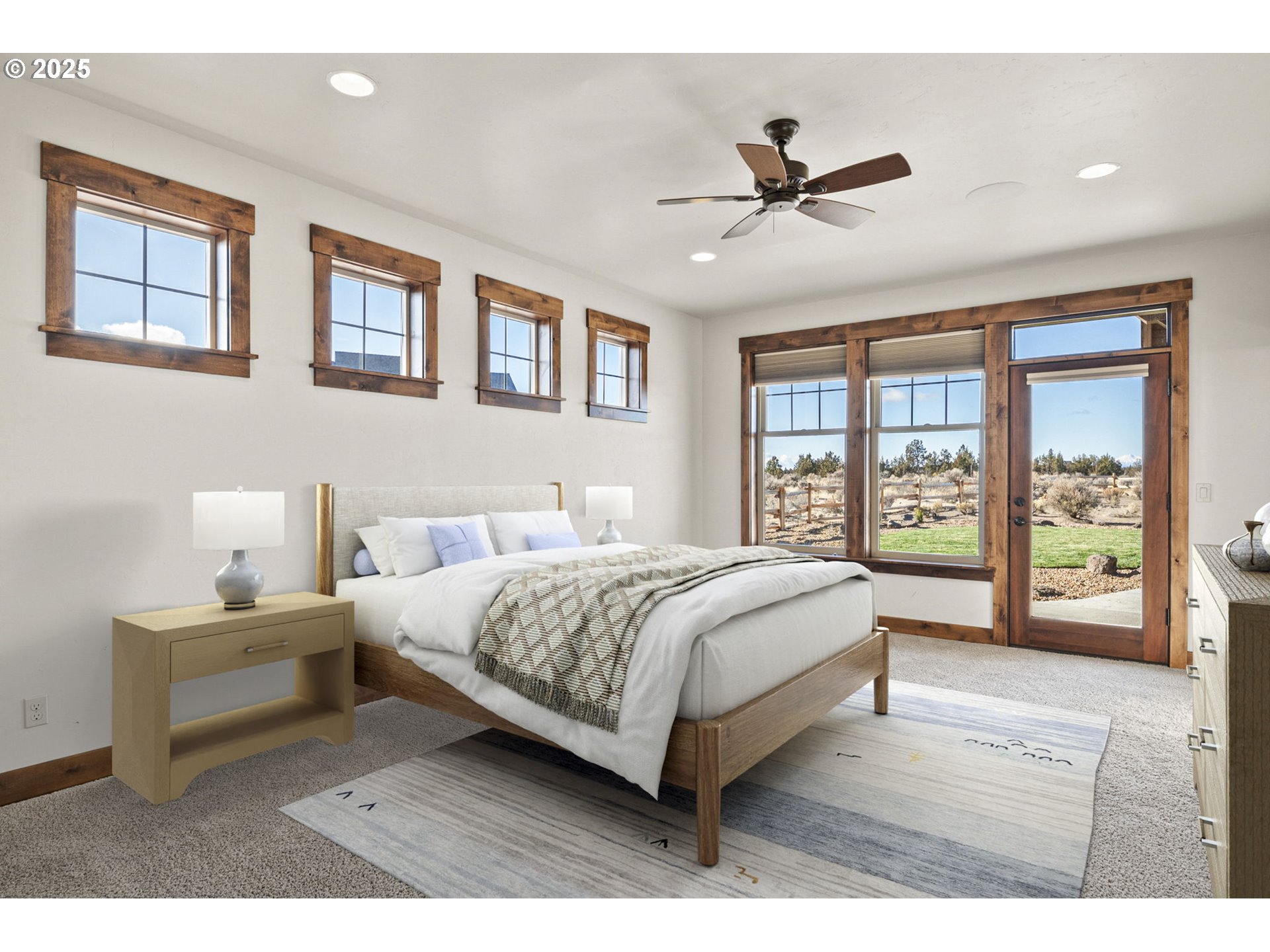16660 Southwest Ranchview Court Powell Butte, OR 97753 - Photo 18 of 32 a spacious bedroom with a bed and a large window
