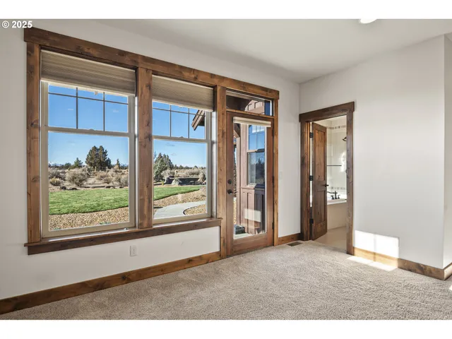 view of a room that has a large window