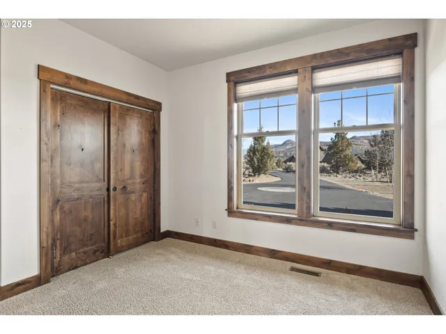 a big room with windows and closet
