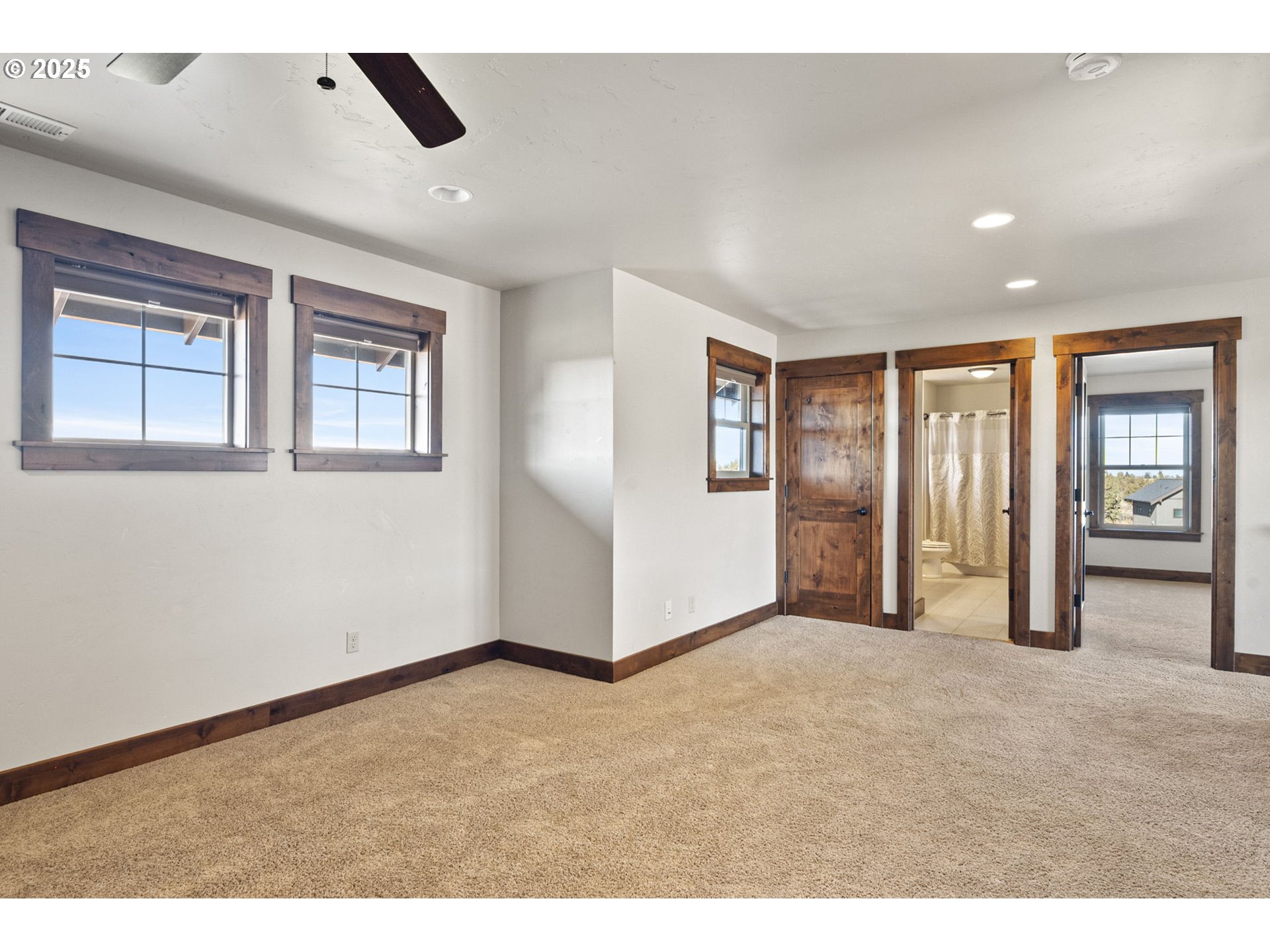 16660 Southwest Ranchview Court Powell Butte, OR 97753 - Photo 25 of 32 a view of an empty room with a window