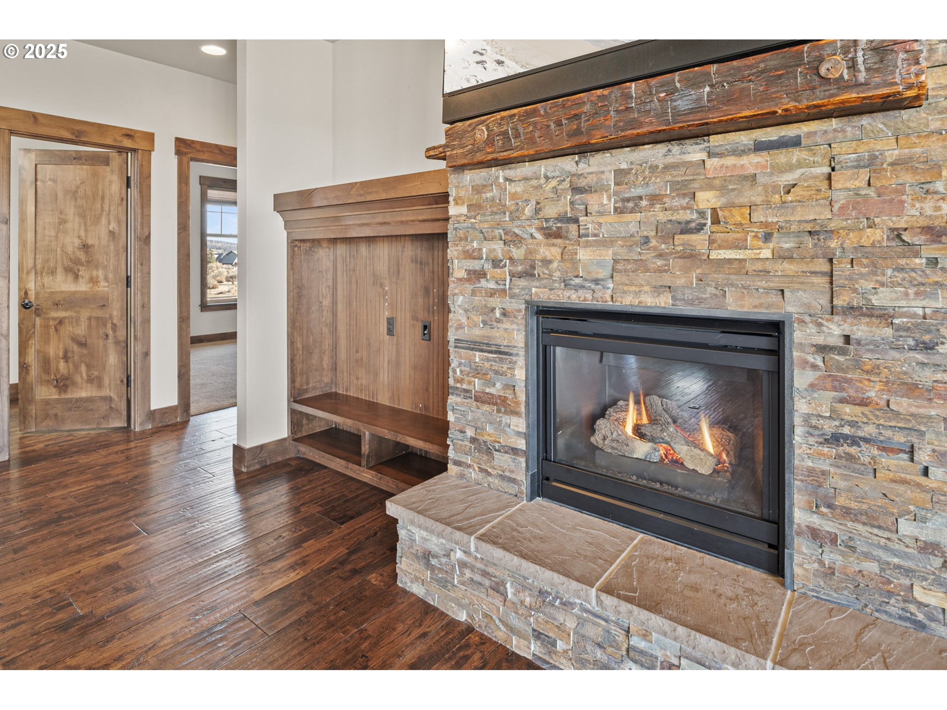 16660 Southwest Ranchview Court Powell Butte, OR 97753 - Photo 6 of 32 a living room with a fireplace