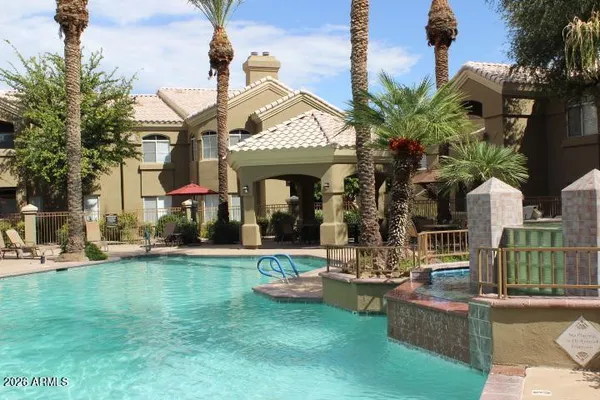 a view of a house with a swimming pool