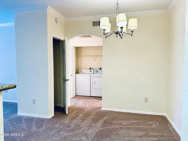 a view of a kitchen and a window