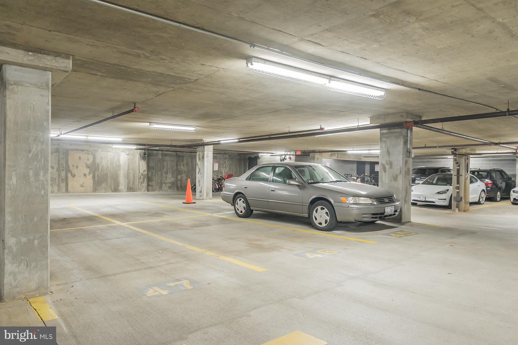2328 Champlain Street Northwest, Unit 329 Washington, DC 20009 - Photo 12 of 25 a view of parking garage with cars