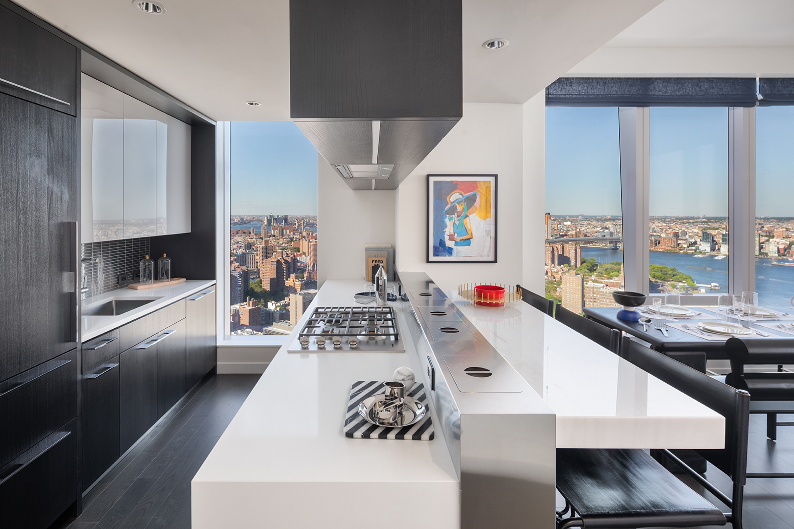 252 South Street, Unit 25H Manhattan, NY 10002 - Photo 3 of 26 a living room with stainless steel appliances furniture a large window and a kitchen view