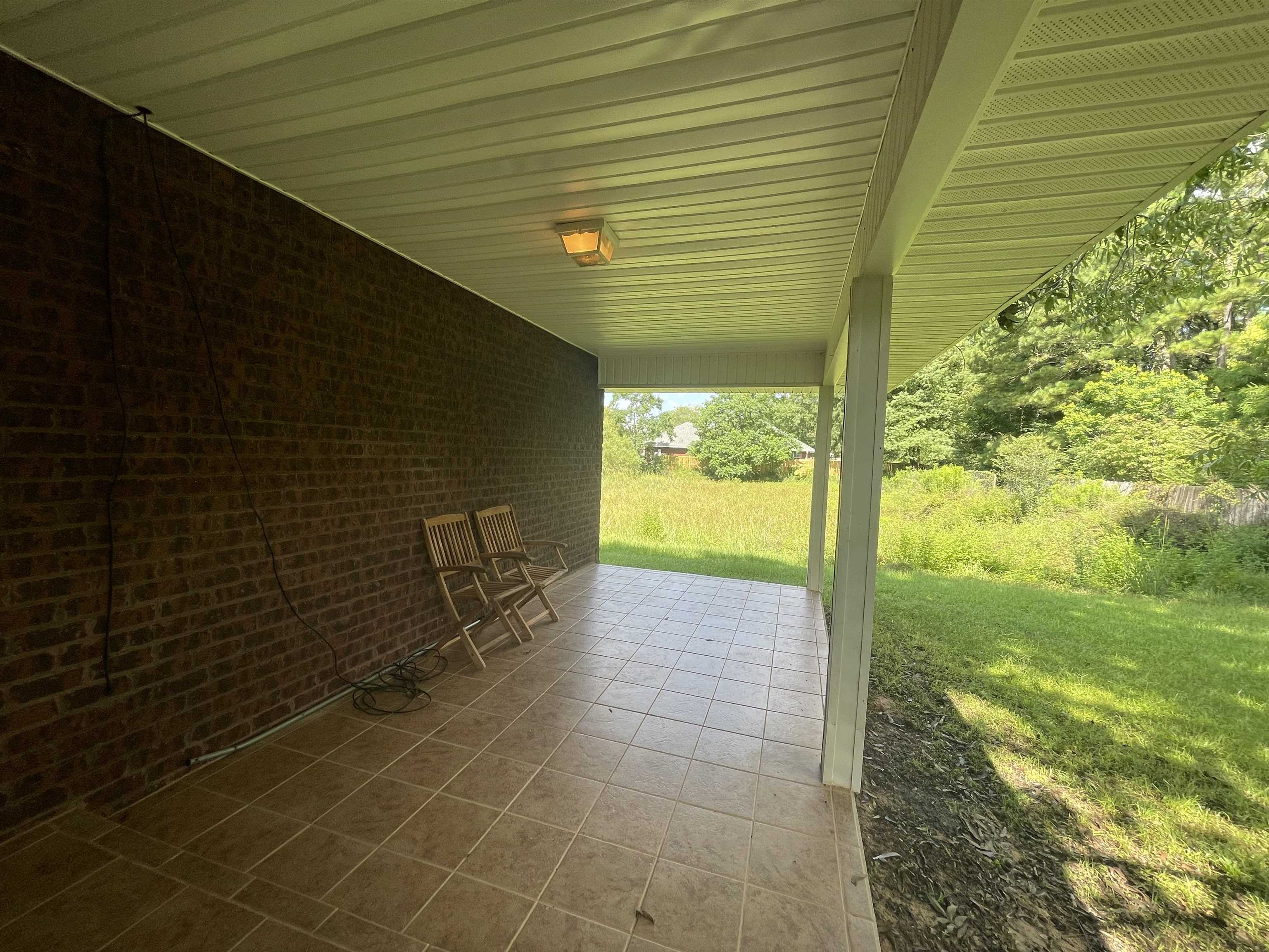 8235 Pecan Court Daphne, AL 36526 - Photo 23 of 23 Backyard Patio