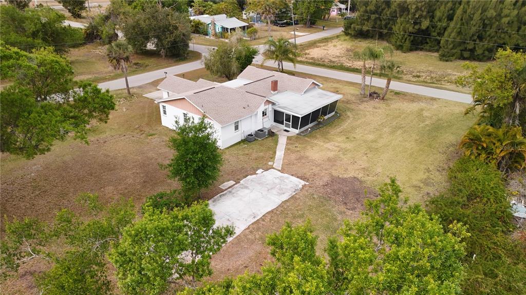 6386 Scott Street Punta Gorda, FL 33950 - Photo 13 of 40 an aerial view of a house with yard and basketball court