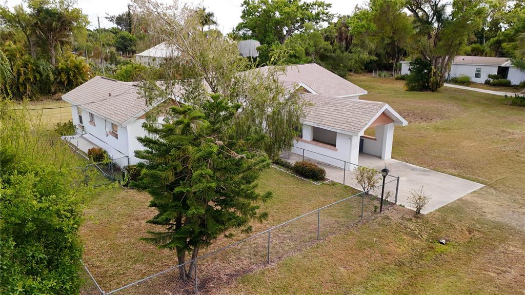 6386 Scott Street Punta Gorda, FL 33950 - Photo 16 of 40 a aerial view of a house with a yard