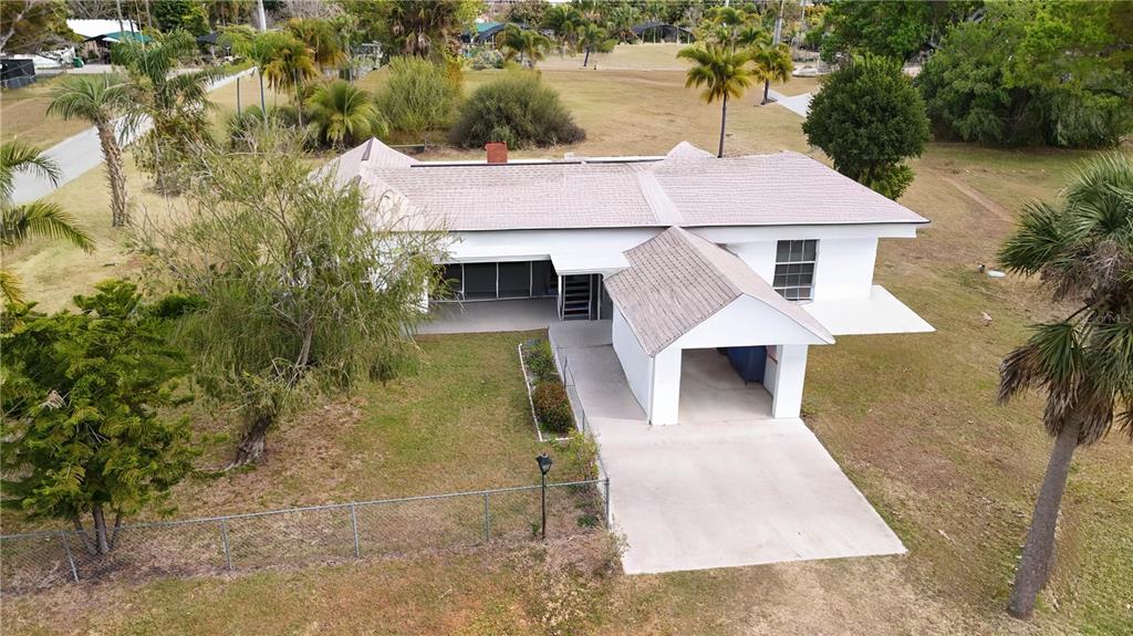 6386 Scott Street Punta Gorda, FL 33950 - Photo 3 of 40 an aerial view of a house with yard