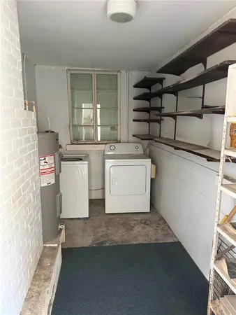 a view of a room with a large window