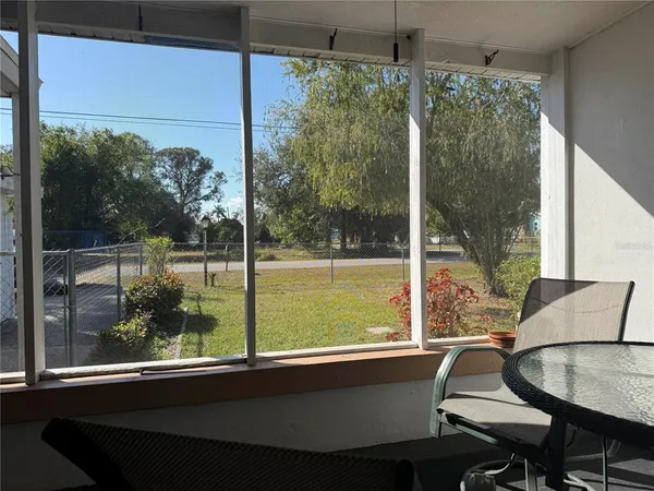 a view of a playground with basketball court
