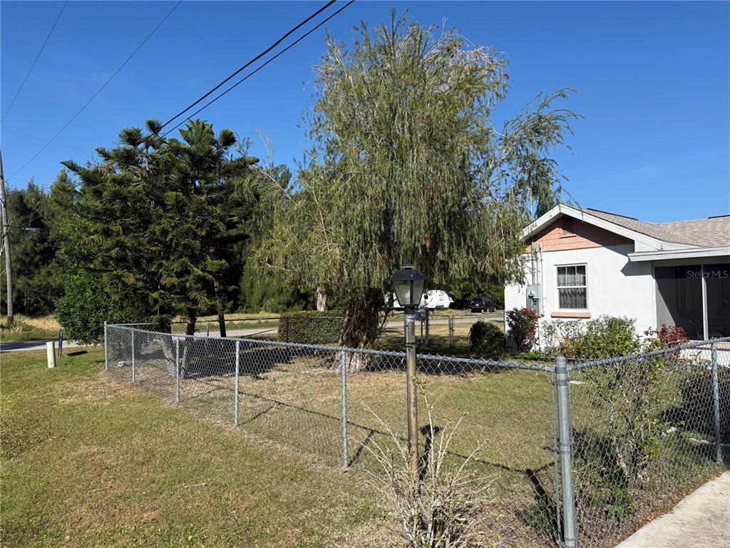 6386 Scott Street Punta Gorda, FL 33950 - Photo 40 of 40 a view of backyard with sitting area