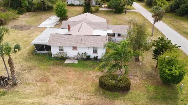 a view of a house with a swimming pool