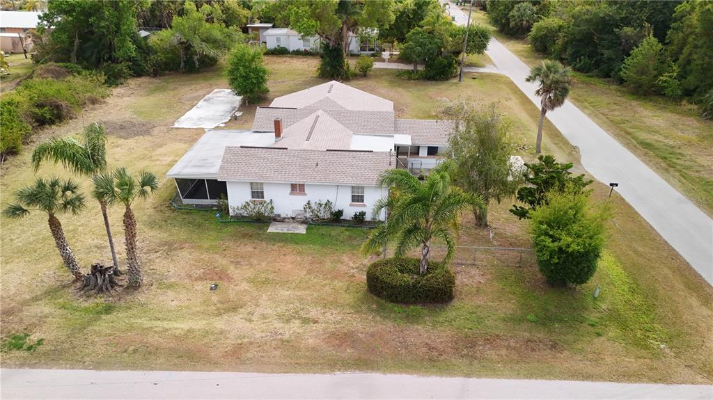 6386 Scott Street Punta Gorda, FL 33950 - Photo 8 of 40 a view of a house with a yard