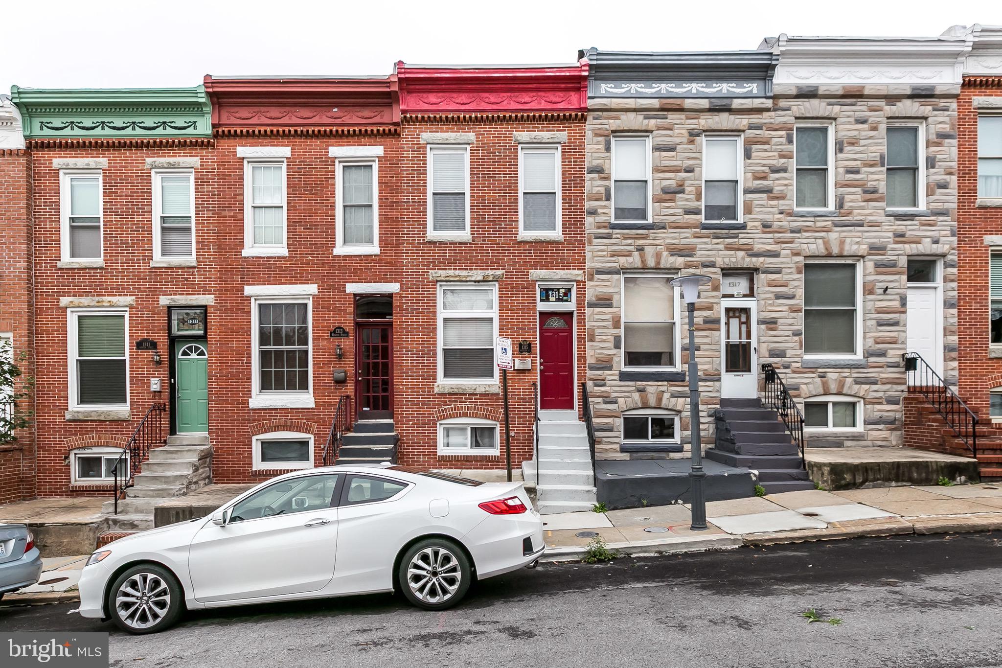 a car parked in front of a house