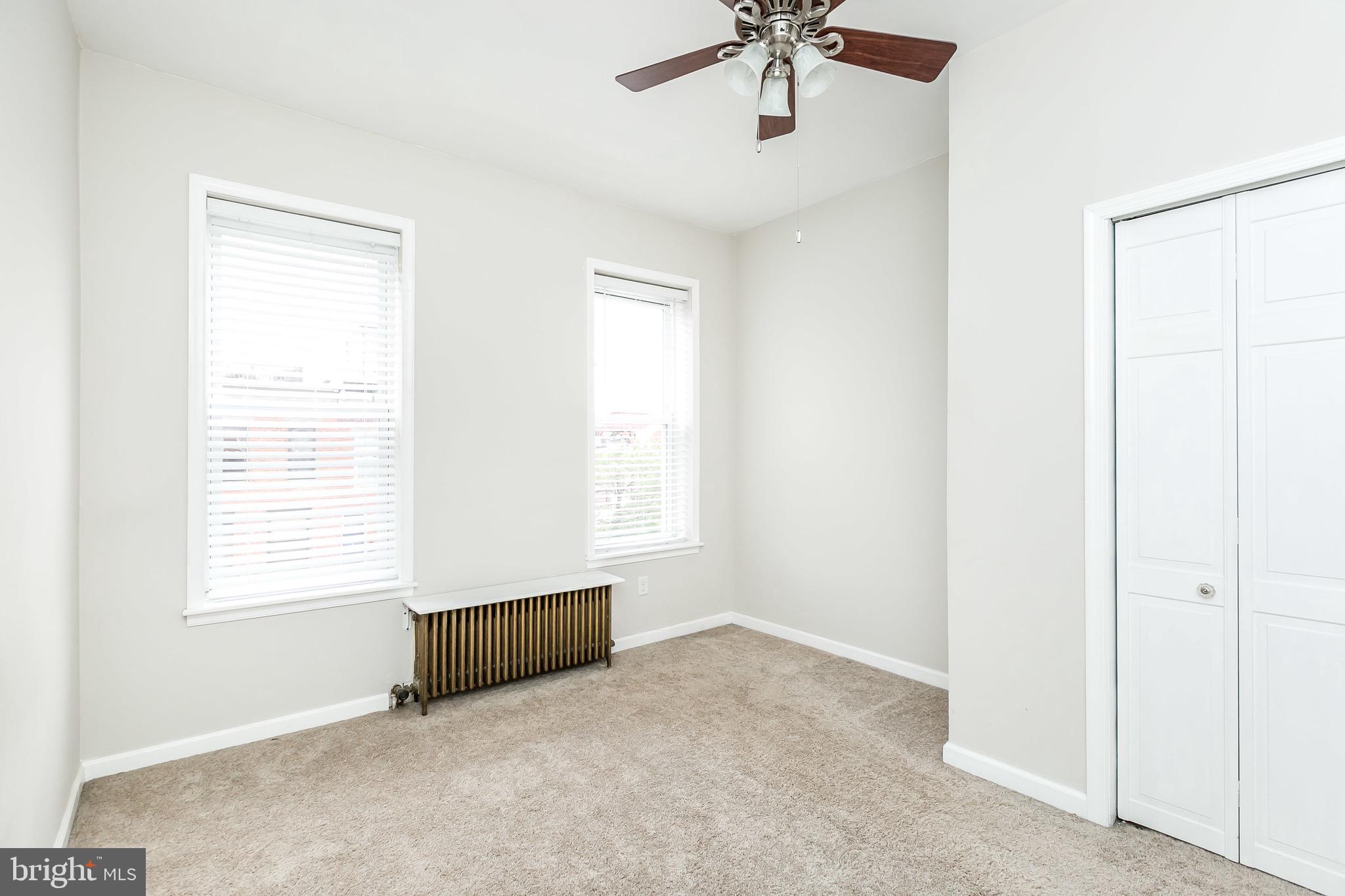 1315 Webster Street Baltimore, MD 21230 - Photo 20 of 29 a view of an empty room with a window