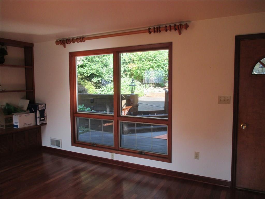 From the family room you see the decks, the water fall and great space and have access the all outdoors