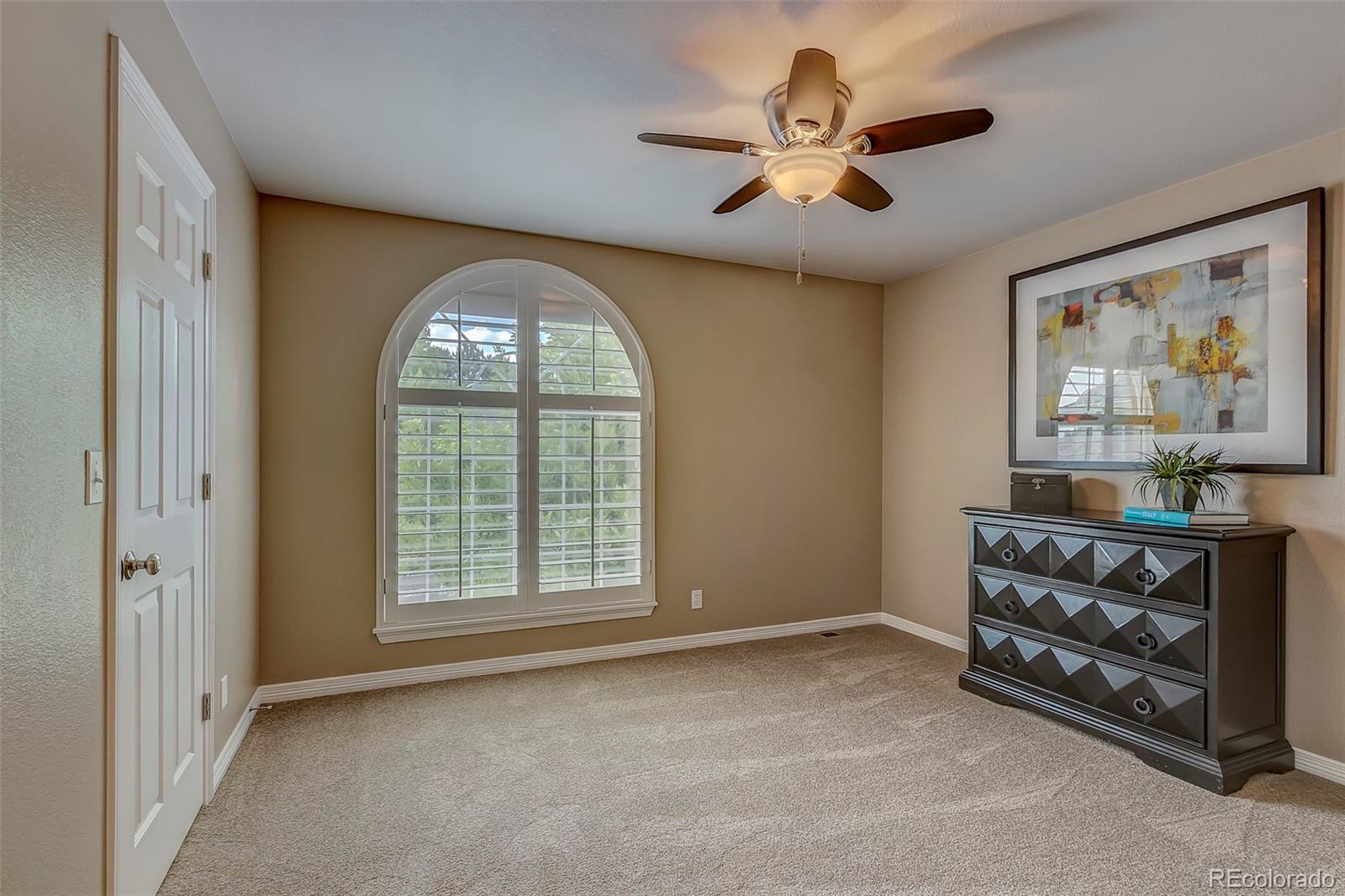 456 West Angus Way Highlands Ranch, CO 80129 - Photo 18 of 40 wooden floor in an empty room with a window