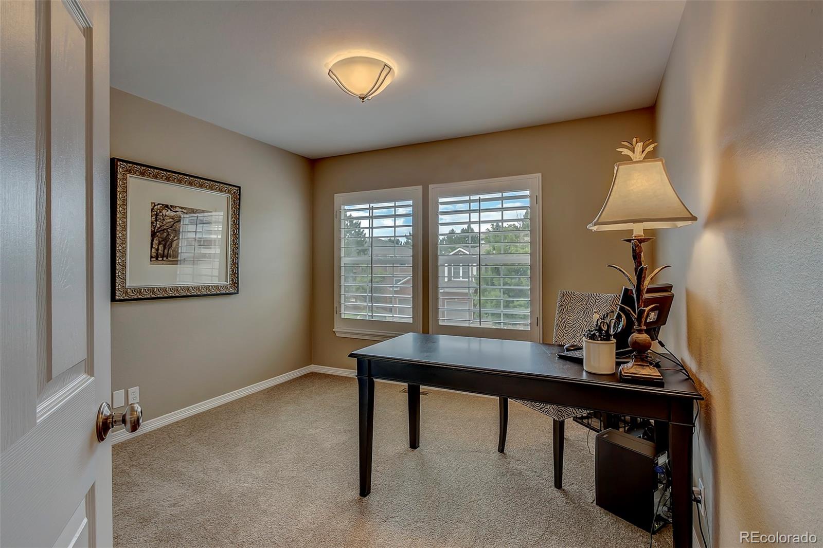 456 West Angus Way Highlands Ranch, CO 80129 - Photo 21 of 40 a room with furniture and window
