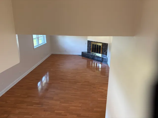 a view of livingroom with furniture and window