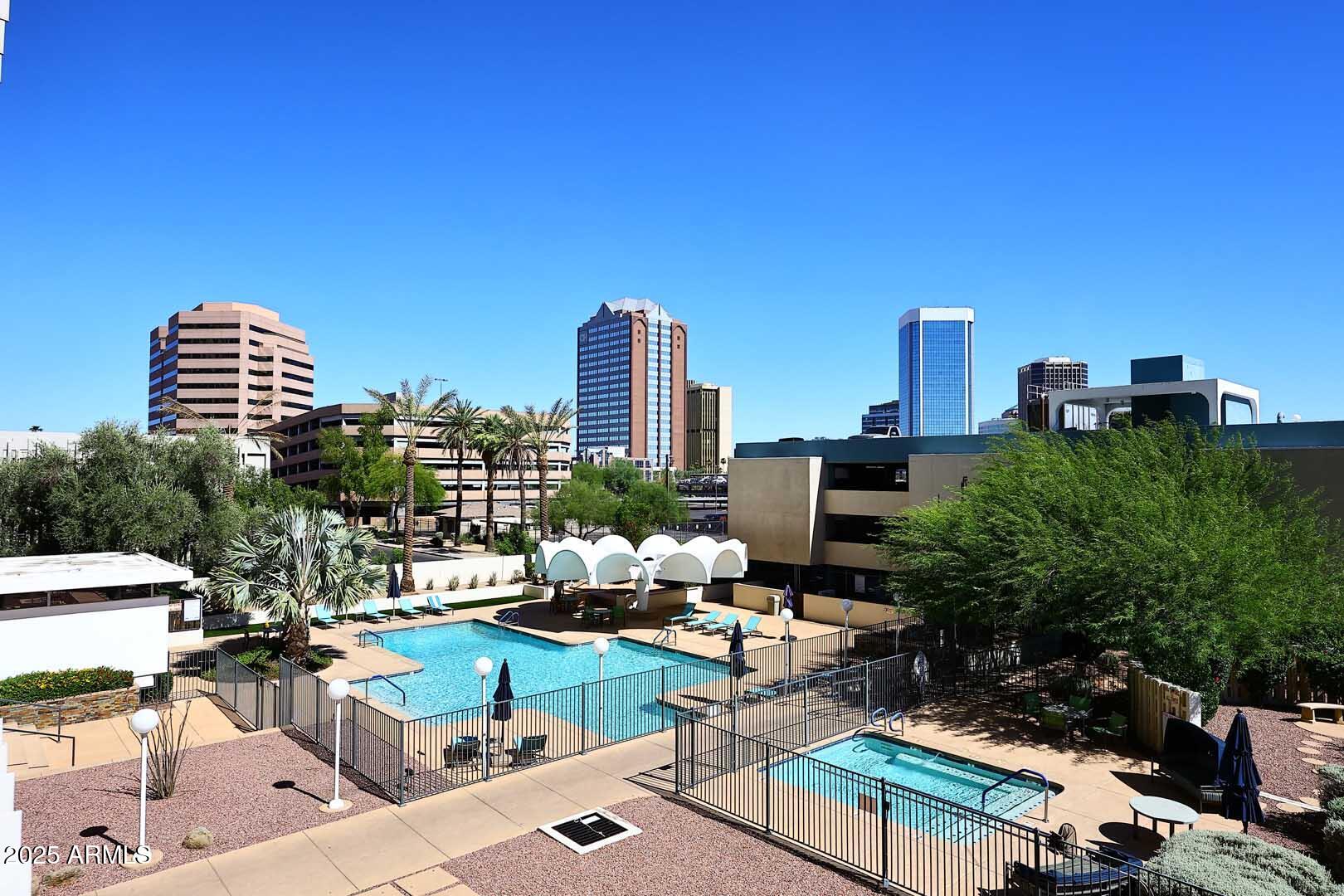 207 West Clarendon Avenue, Unit 2A Phoenix, AZ 85013 - Photo 11 of 36 Primary Bedroom-Balcony View2