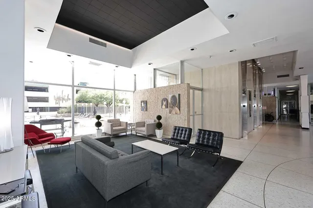 a view of a patio with swimming pool