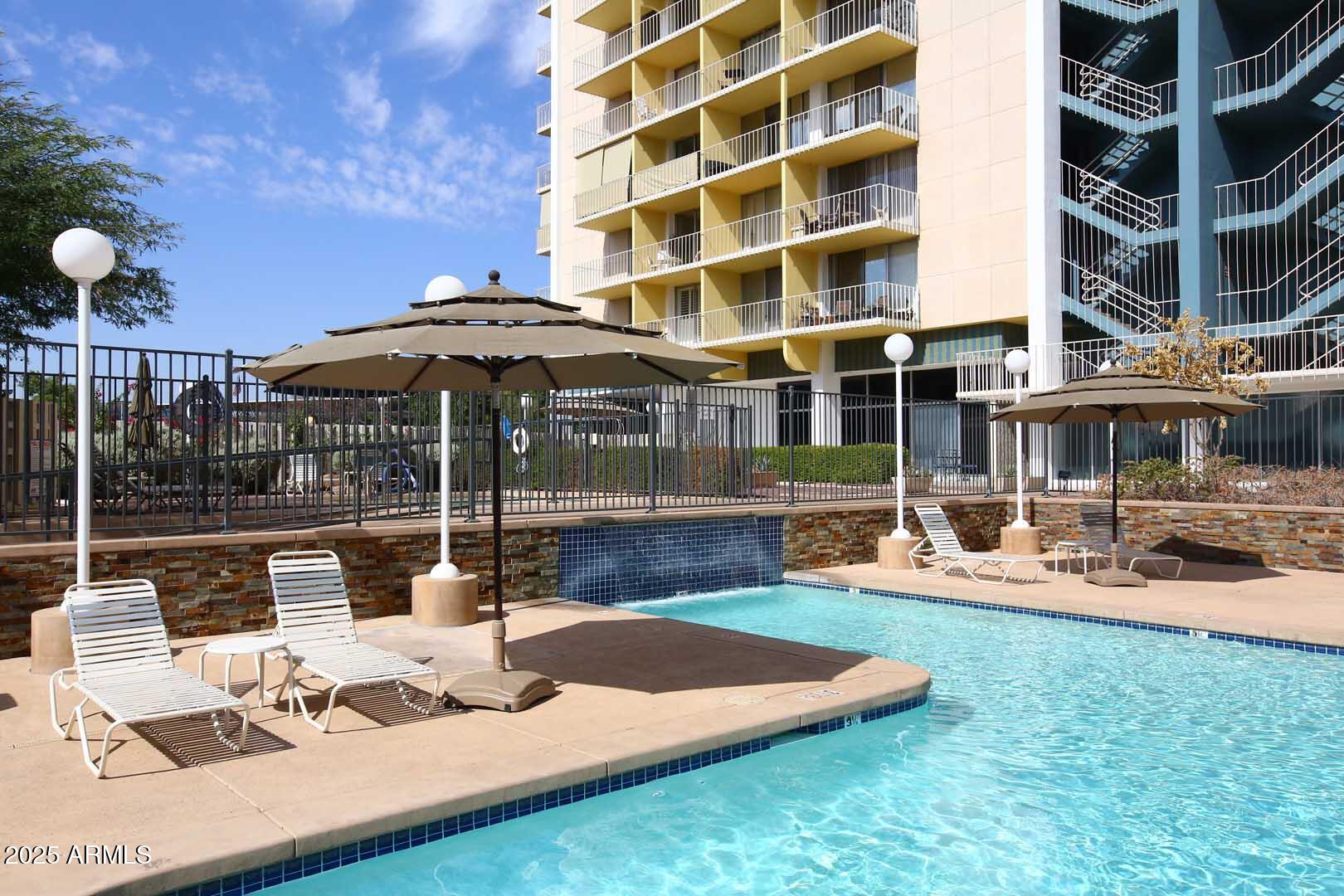 207 West Clarendon Avenue, Unit 2A Phoenix, AZ 85013 - Photo 36 of 36 Pool Lounge Area