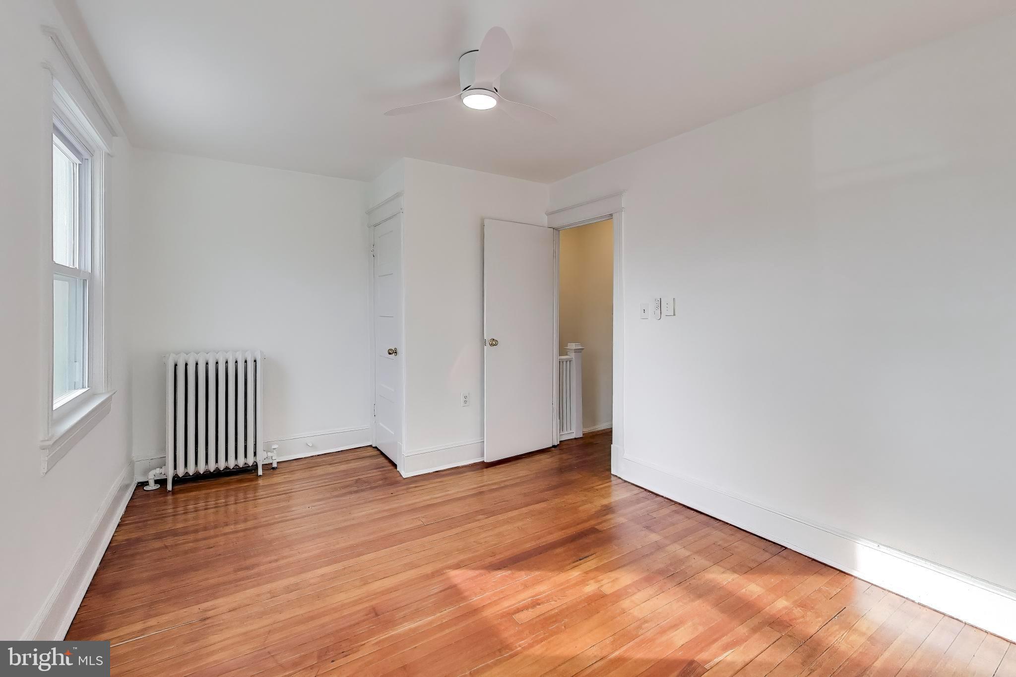 743 Hamilton Street Northwest Washington, DC 20011 - Photo 17 of 43 Newly refinished hardwood floors on upper level.