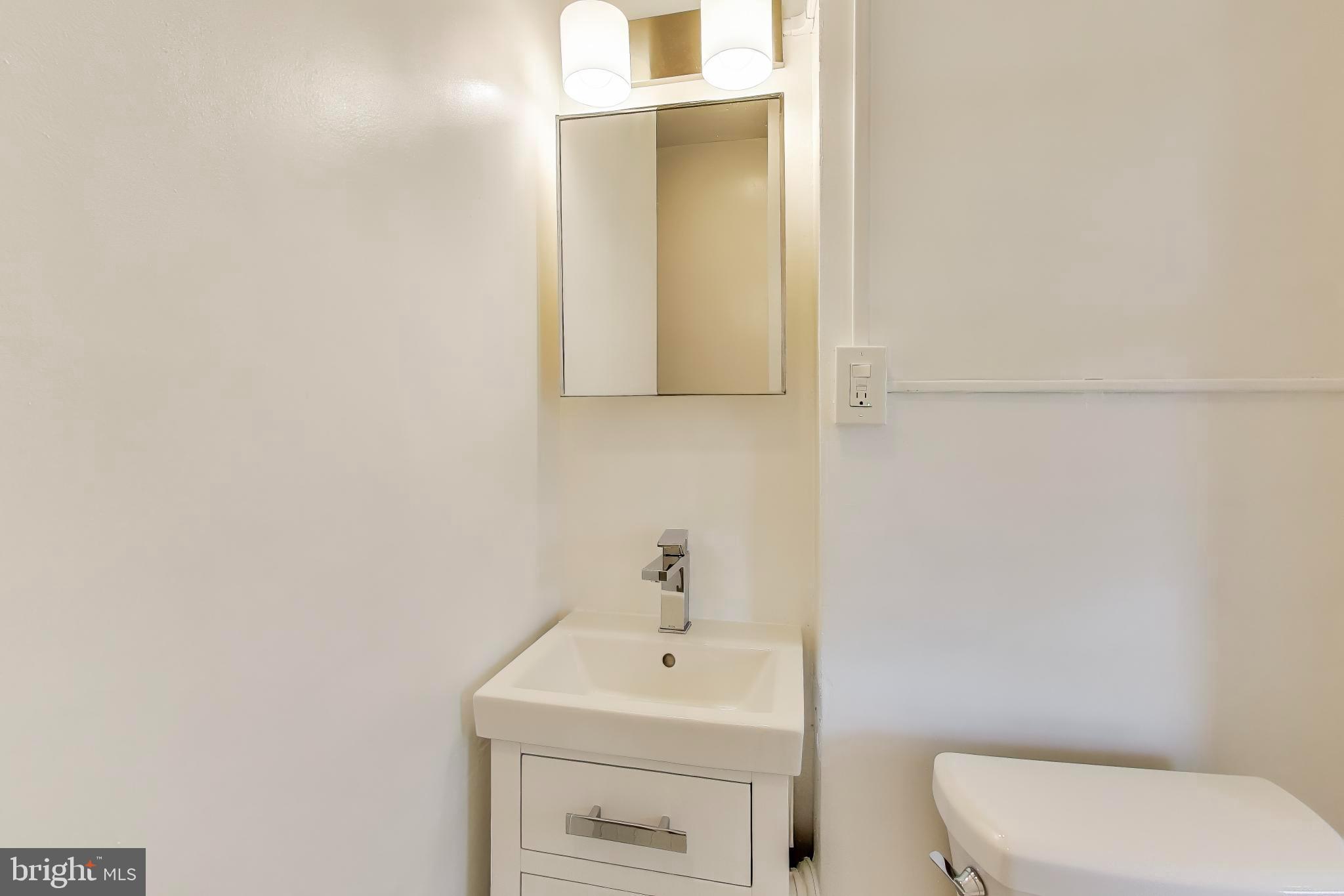 743 Hamilton Street Northwest Washington, DC 20011 - Photo 24 of 43 Upper level bathroom with updated fixtures...